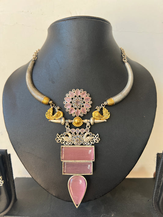 Dual tone necklace set in pink stone