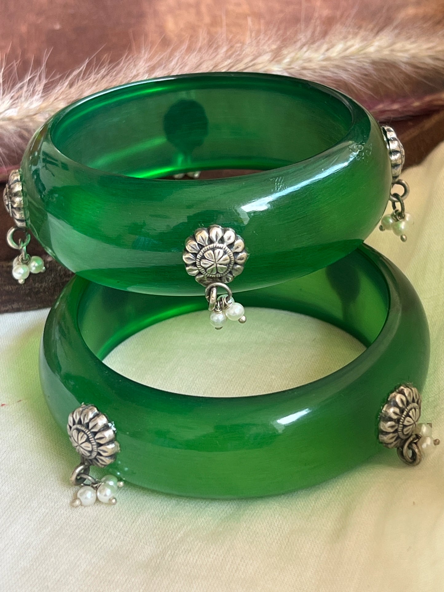 Green Resin bangles with silver motifs and pearl hangings