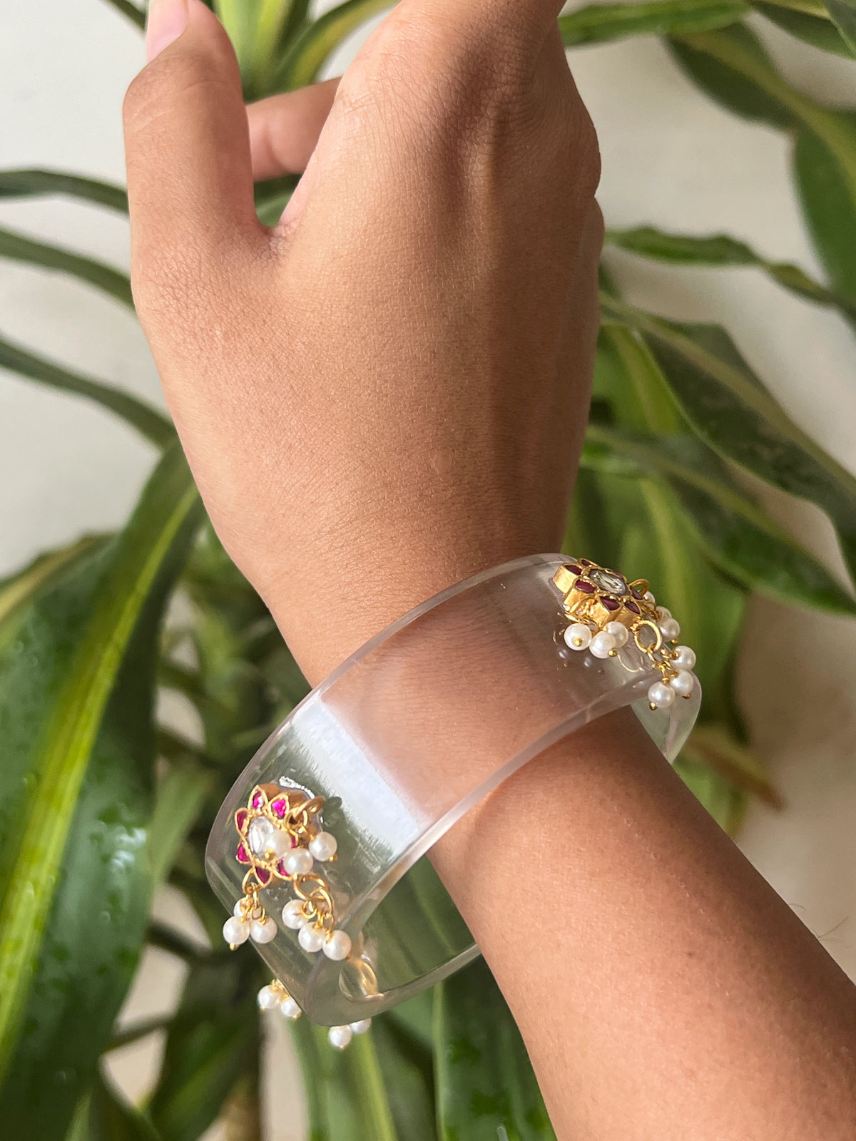 Transparent Resin bangles with kundhan star motifs