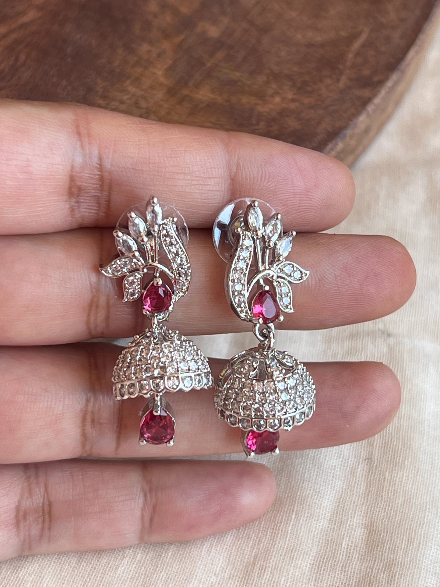 Red stone jhumkas 1127000559