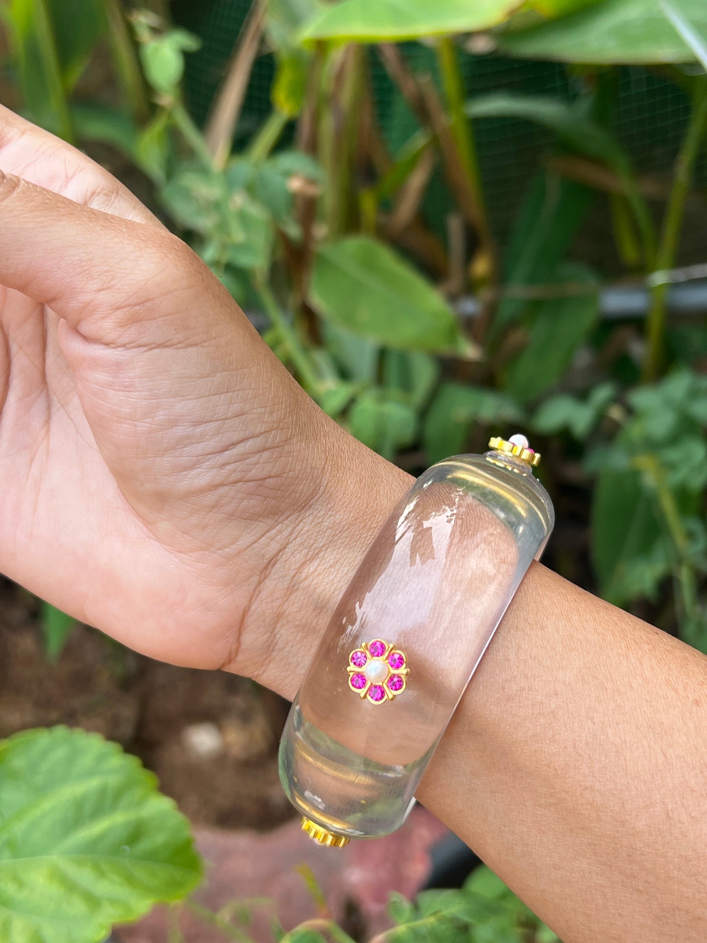 Transparent Resin bangles with pink stone motifs