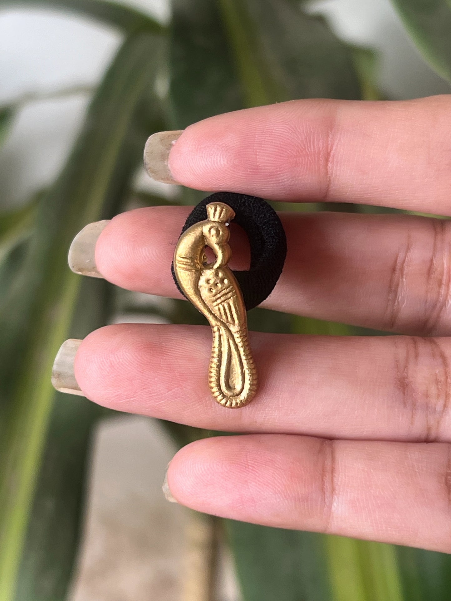 Brass peacock band