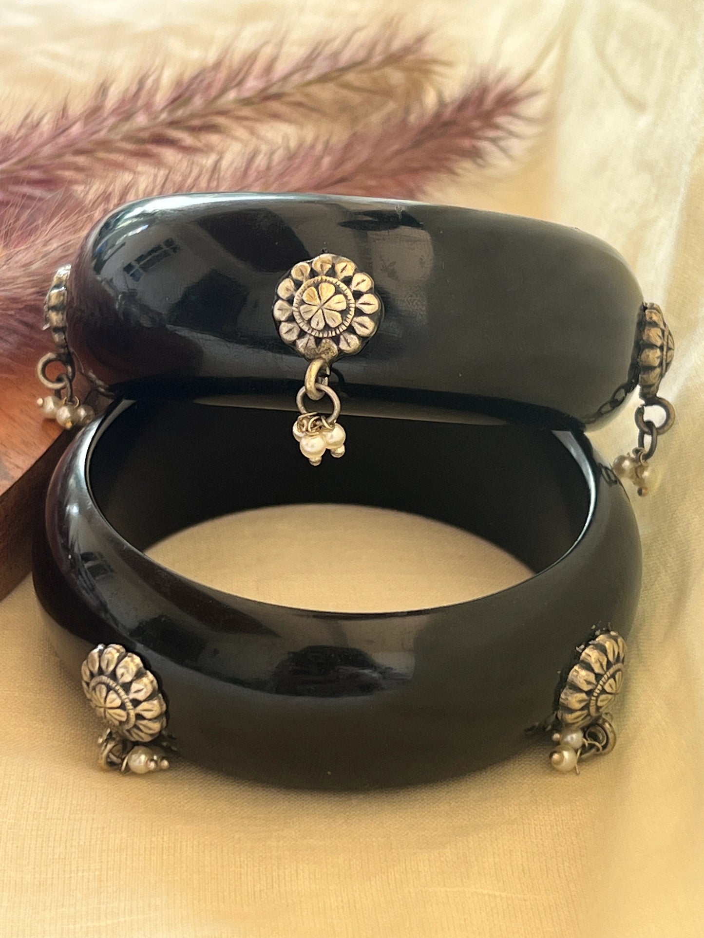 Black Resin bangles with silver motifs and pearl hangings
