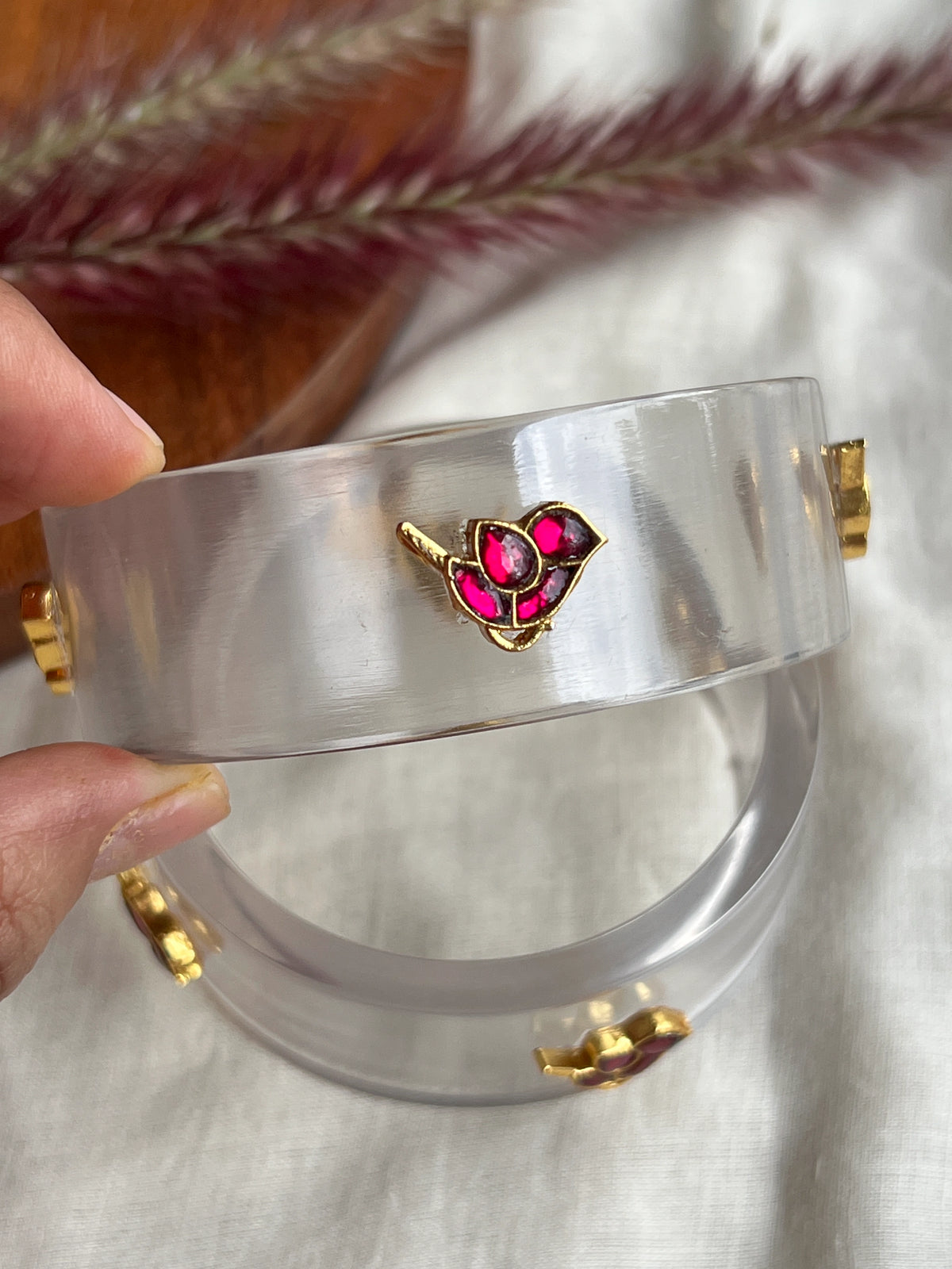 Transparent Resin bangles with kundhan bird motifs (red)