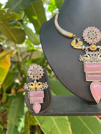 Dual tone necklace set in pink stone