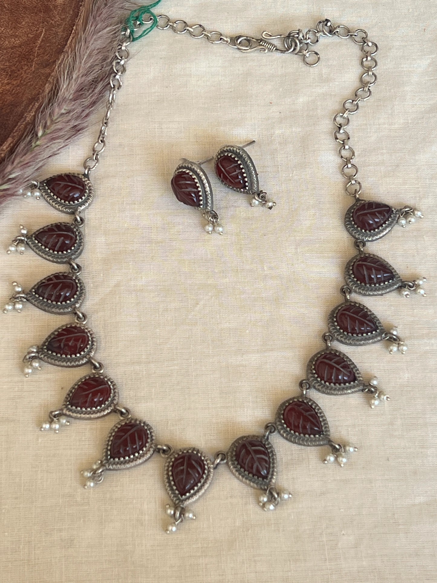Carved stone necklace set