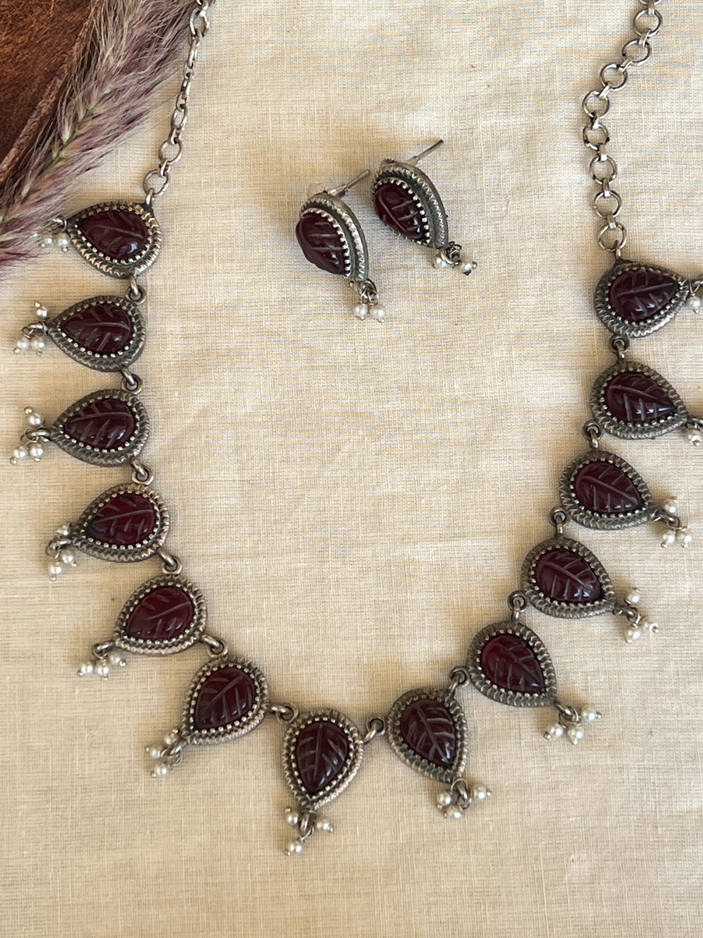 Carved stone necklace set