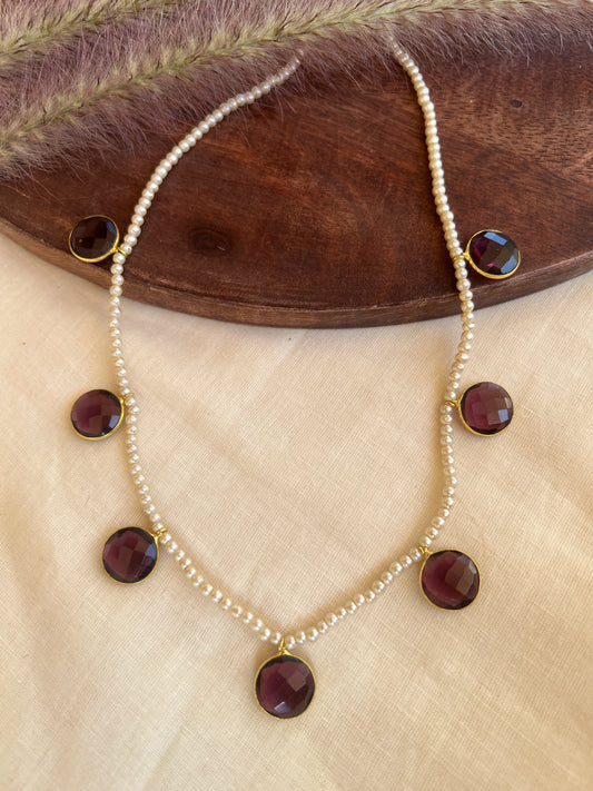 Cut stone pearl necklace