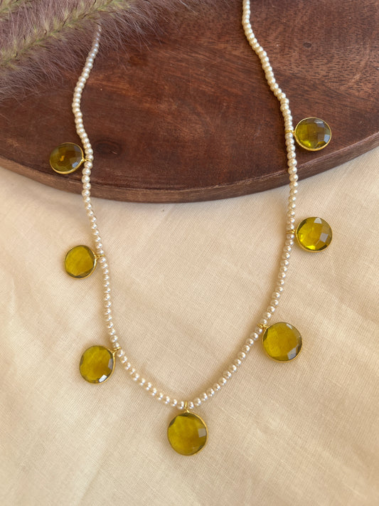 Cut stone pearl necklace