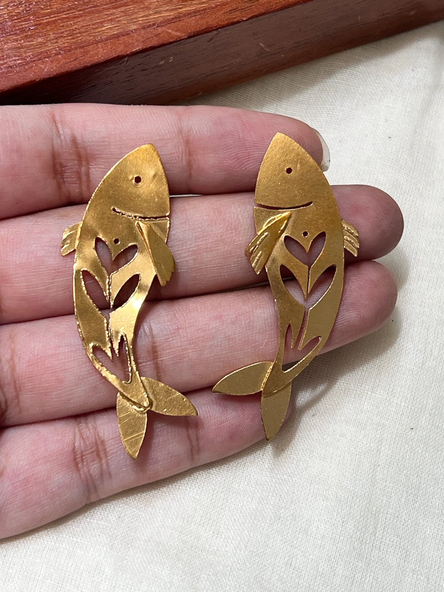 statement fish earrings