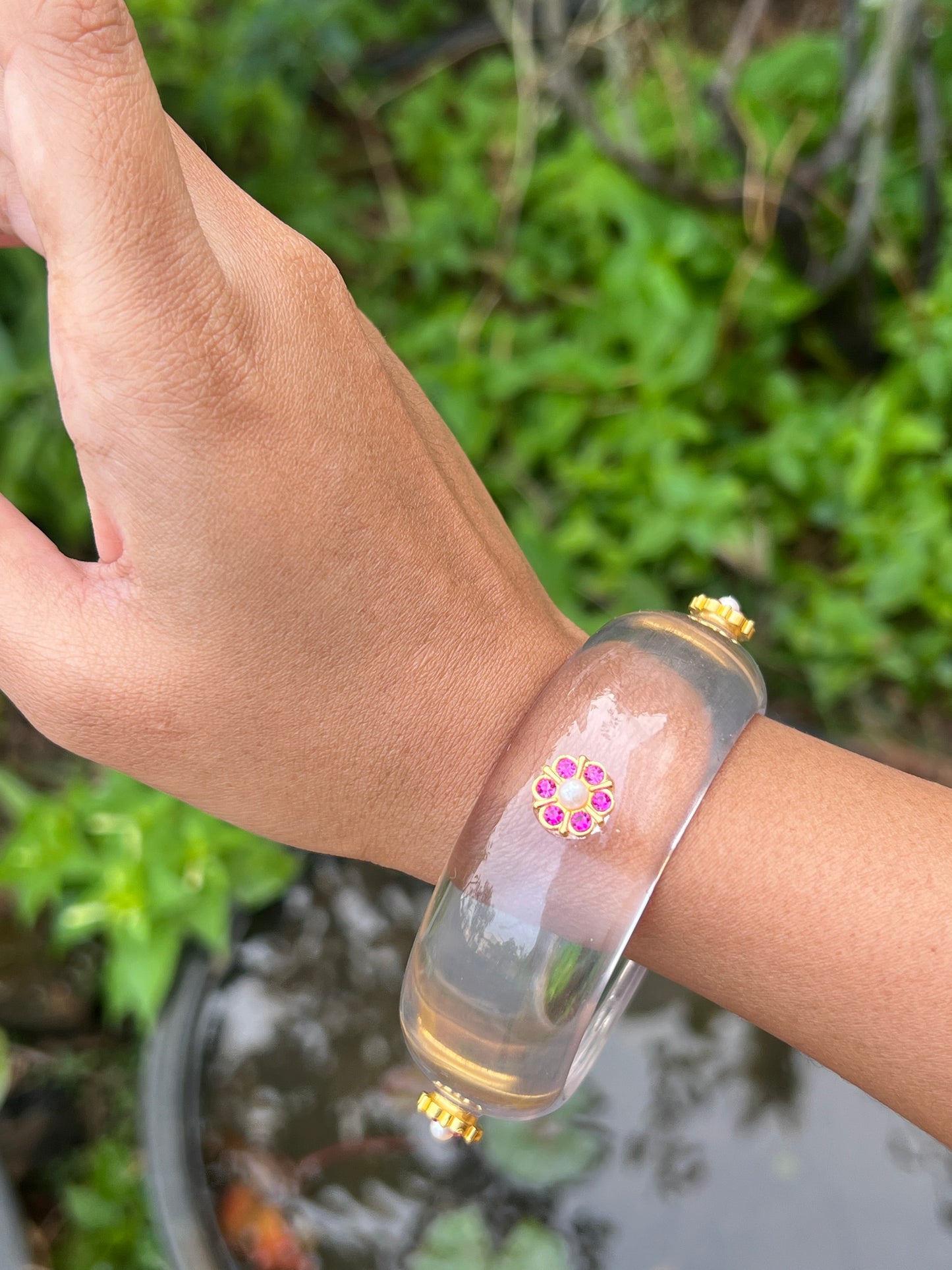 Transparent Resin bangles with pink stone motifs
