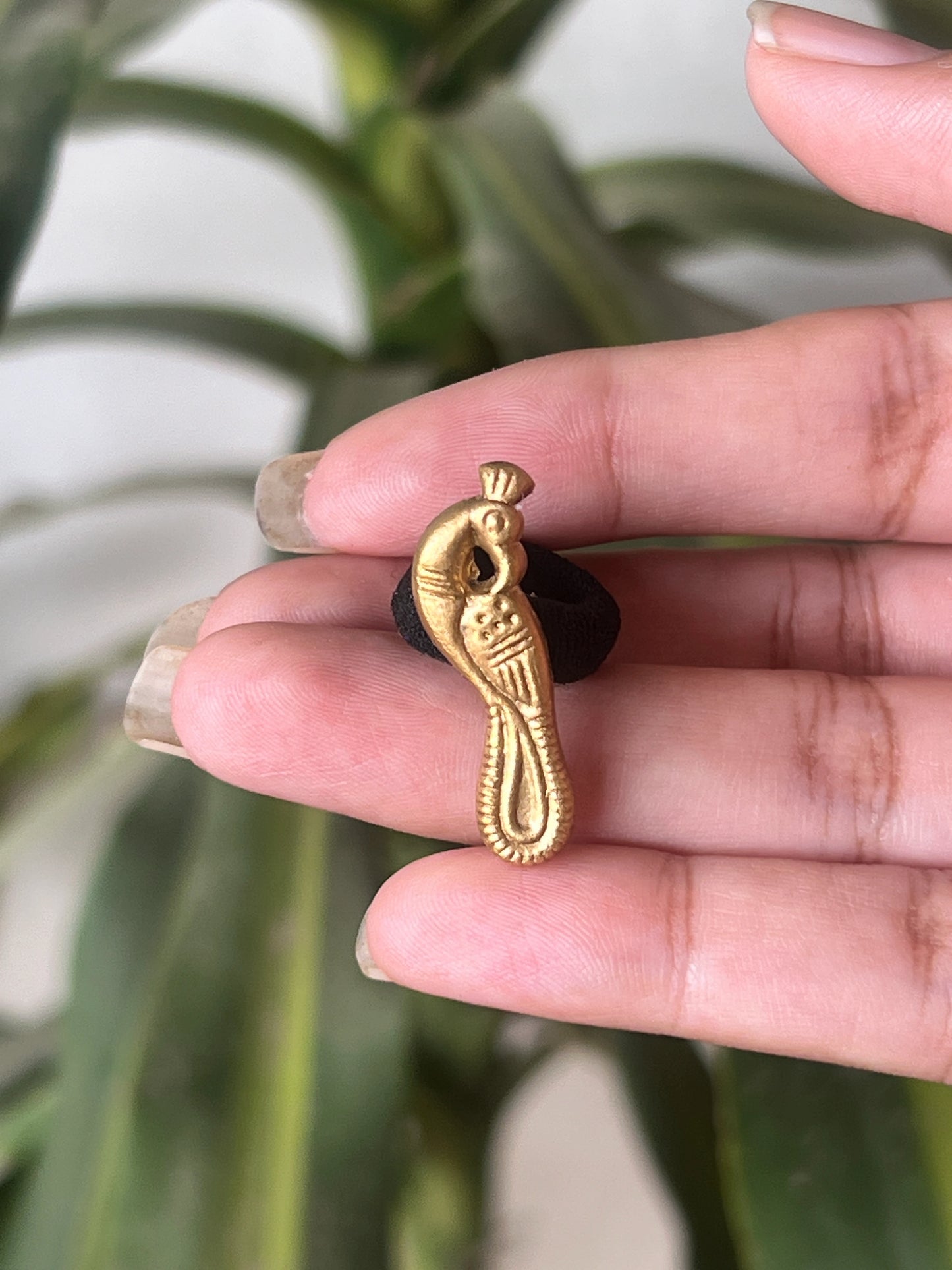 Brass peacock band