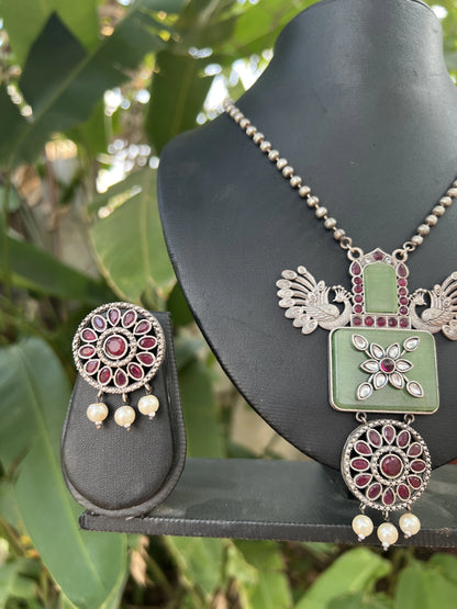 Oxidised green stone pendant set
