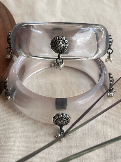Transparent Resin bangles with silver motifs and pearl hangings