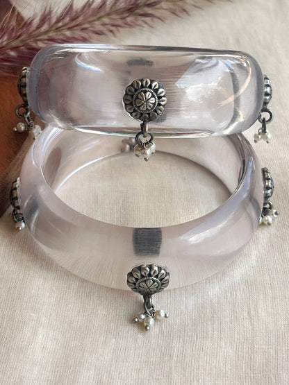 Transparent Resin bangles with silver motifs and pearl hangings