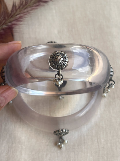 Transparent Resin bangles with silver motifs and pearl hangings
