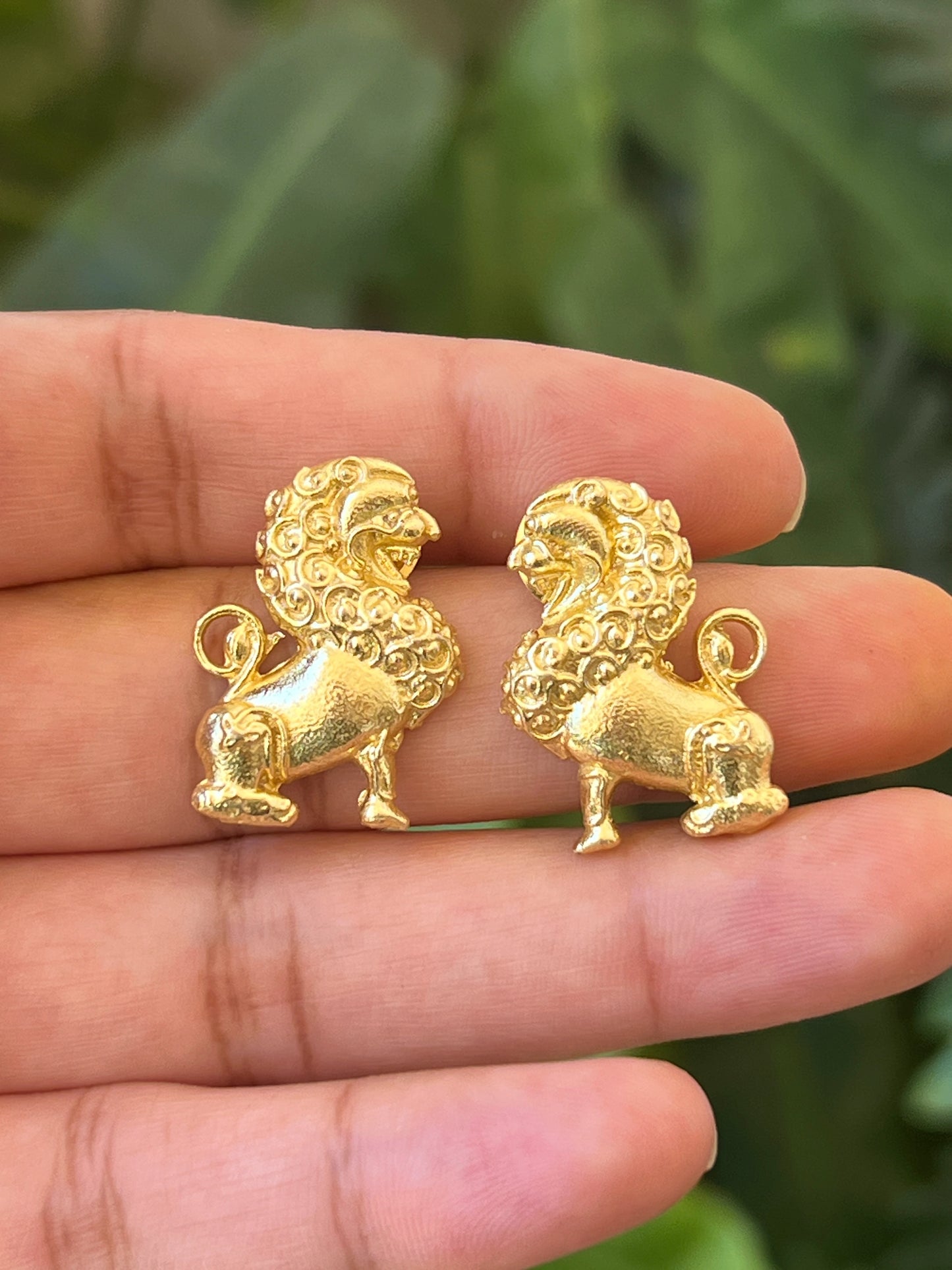 Lion studs